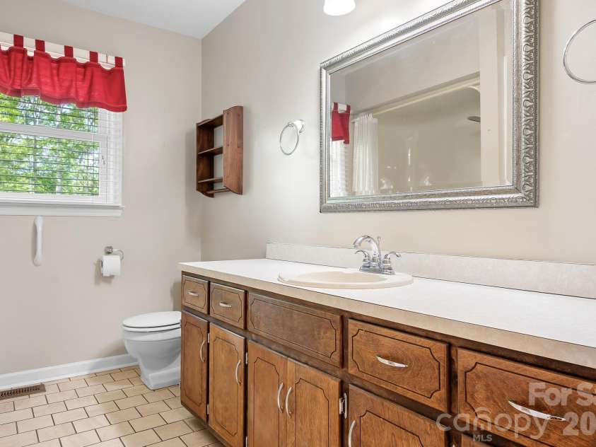 5343 Cannon Drive, Granite Falls, NC 28630.  MLS# CAR4366225, YatesRealty ID 13393. Second Spacious full bathroom