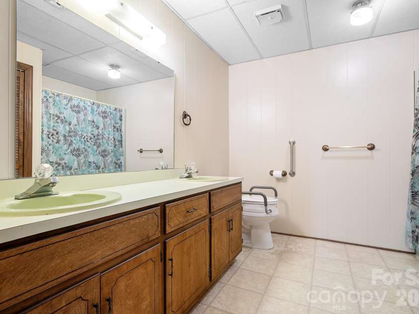 5343 Cannon Drive, Granite Falls, NC 28630.  MLS# CAR4366225, YatesRealty ID 13393. Third full bathroom in basement