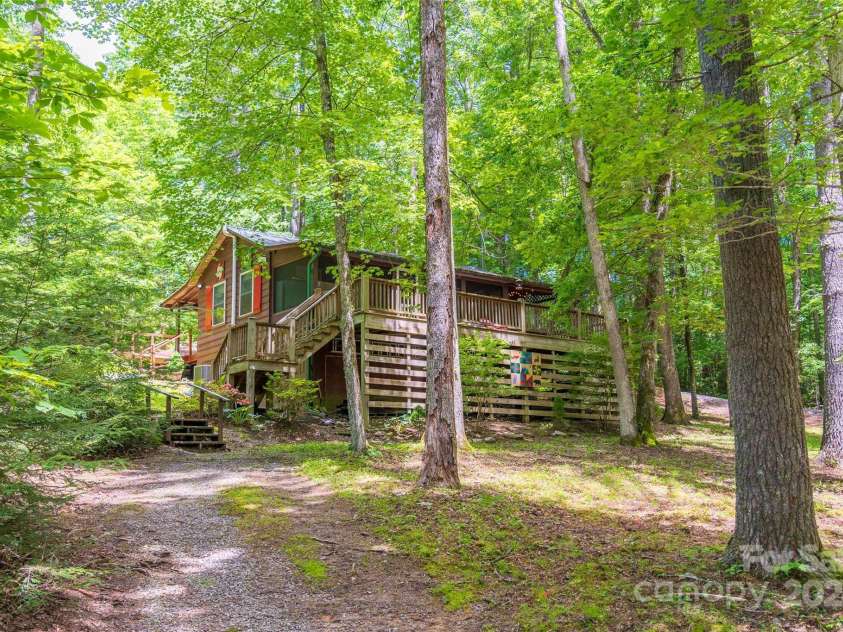 78 Smiling Fox Trail, Brevard, NC 28712.  MLS# CAR4176816, YatesRealty ID 134. Main home rear exterior
