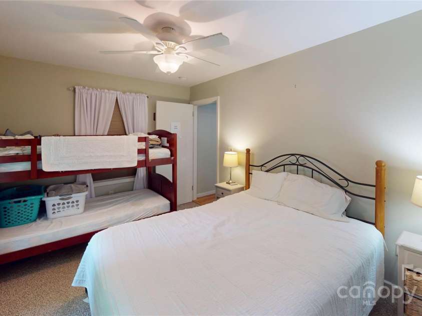 78 Smiling Fox Trail, Brevard, NC 28712.  MLS# CAR4176816, YatesRealty ID 134. Main house bedroom