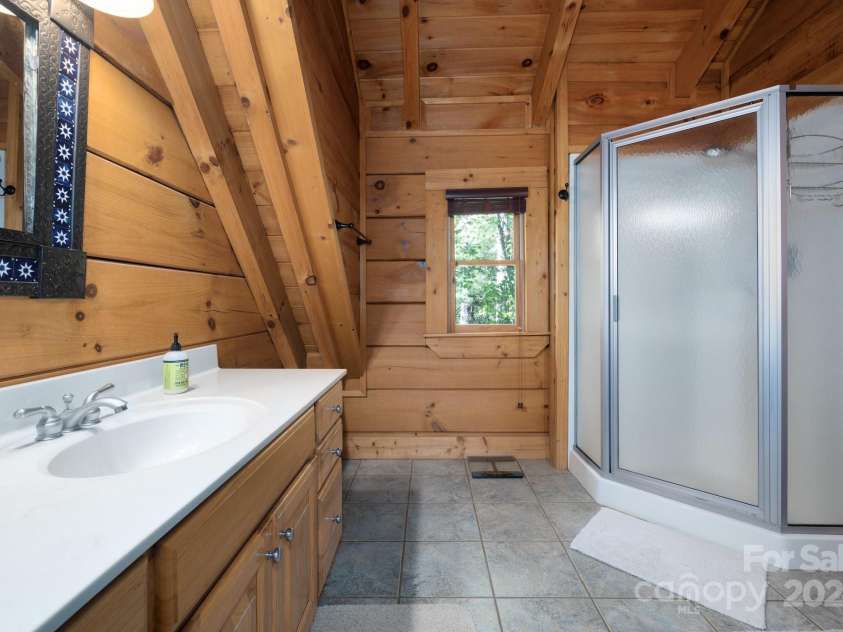 117 Laurel Lakes Parkway, Lake Lure, NC 28746.  MLS# CAR4182403, YatesRealty ID 1340. Ensuite