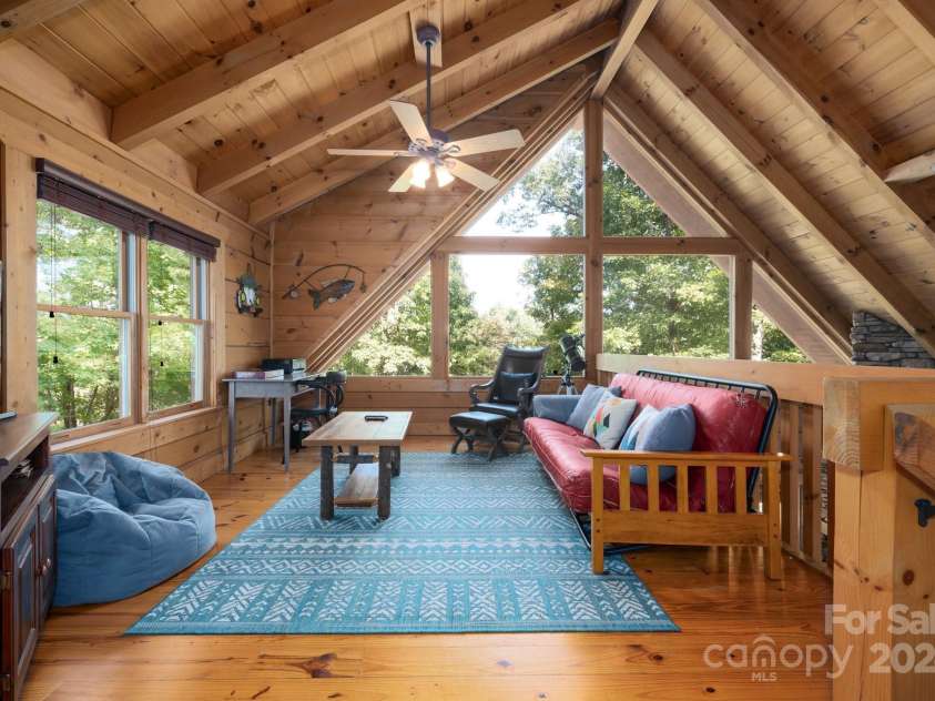 117 Laurel Lakes Parkway, Lake Lure, NC 28746.  MLS# CAR4182403, YatesRealty ID 1340. Family room loft