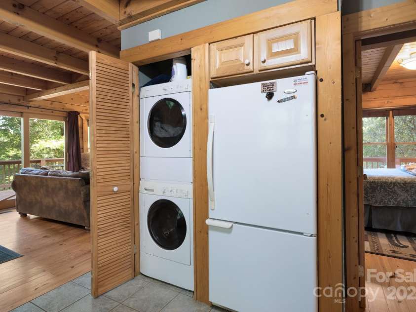 117 Laurel Lakes Parkway, Lake Lure, NC 28746.  MLS# CAR4182403, YatesRealty ID 1340. Laundry closet with stackables