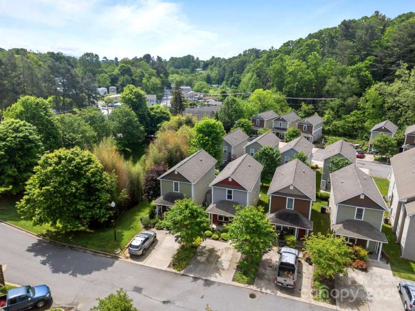 25 Mill Creek Loop, Asheville, NC 28806.  MLS# CAR4257997, YatesRealty ID 13404. #25 is the second unit and the HOA takes care of all of the outside plants