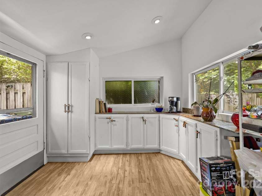 55 Herron Avenue, Asheville, NC 28806.  MLS# CAR4256476, YatesRealty ID 13409. Extra storage in kitchen