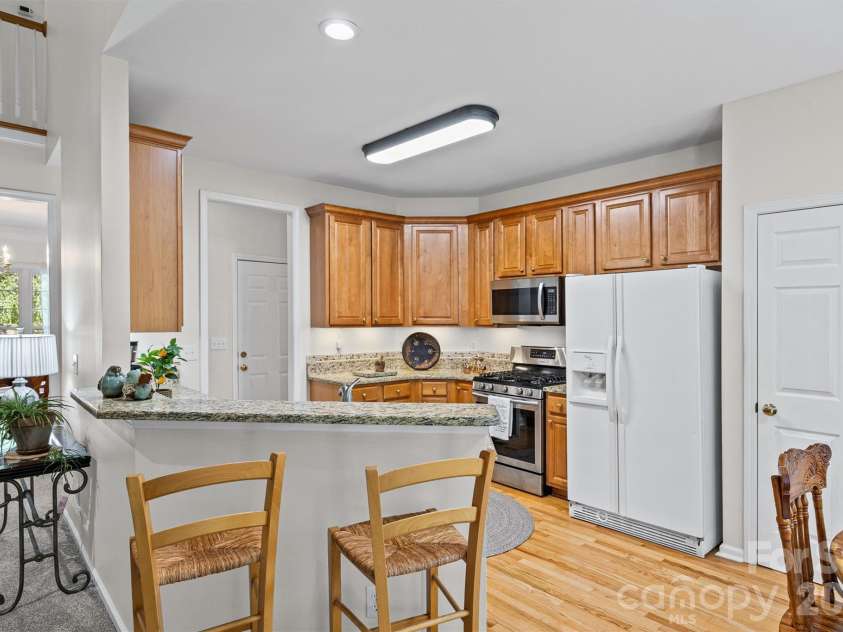 1836 Montague Road, Clover, SC 29710.  MLS# CAR4360574, YatesRealty ID 13414. Kitchen and bar seating