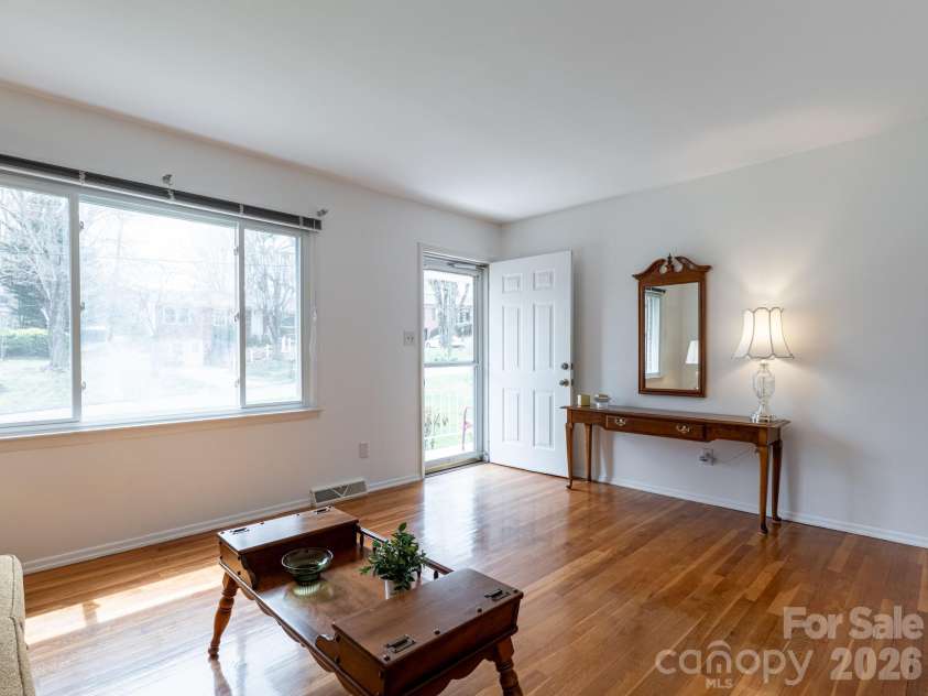 56 Skyview Terrace, Asheville, NC 28806.  MLS# CAR4360623, YatesRealty ID 13416. Living room main level toward front door.