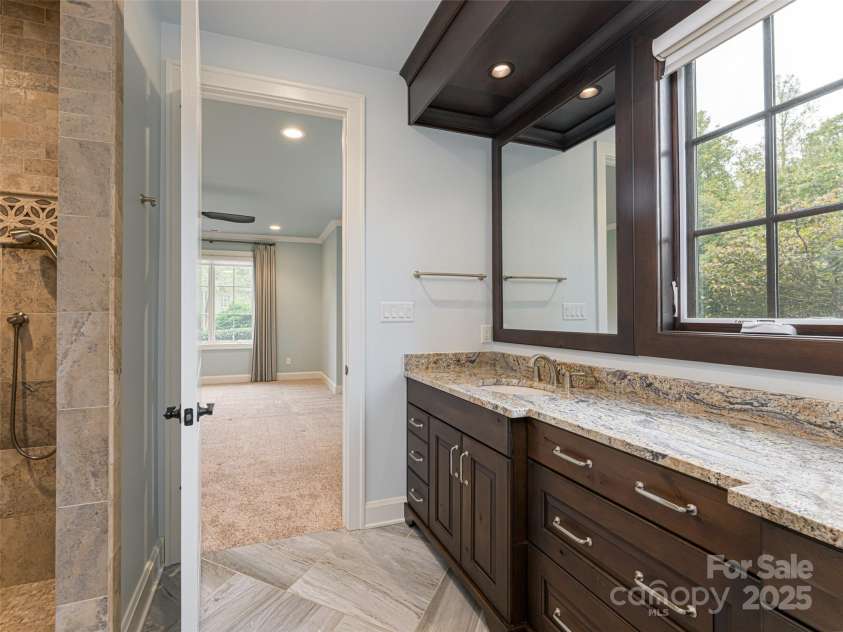 87 Chantilly Drive, Asheville, NC 28804.  MLS# CAR4306861, YatesRealty ID 13417. Even the master bath is full of light