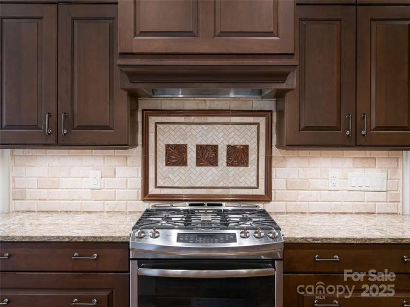 87 Chantilly Drive, Asheville, NC 28804.  MLS# CAR4306861, YatesRealty ID 13417. Metal tile detail