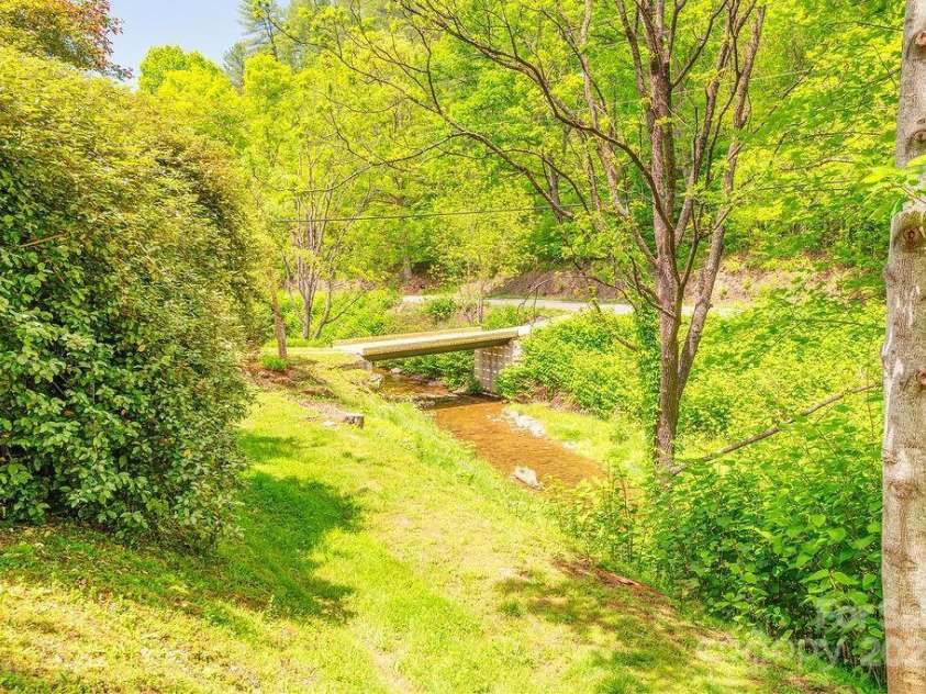 2102 Walnut CreeK Road, Marshall, NC 28753.  MLS# CAR4235544, YatesRealty ID 13420. Creek & Walking Path