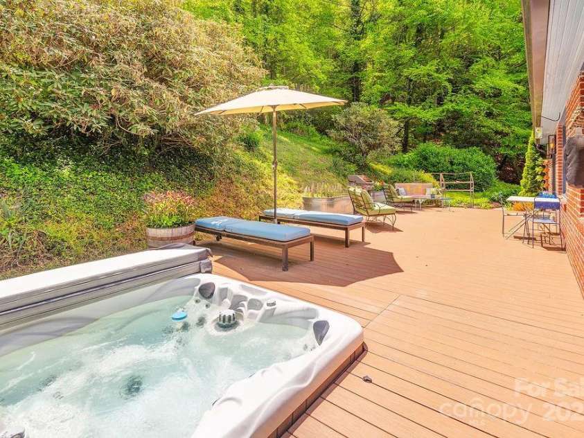 2102 Walnut CreeK Road, Marshall, NC 28753.  MLS# CAR4235544, YatesRealty ID 13420. Enjoy the Night Sky from the Hot Tub
