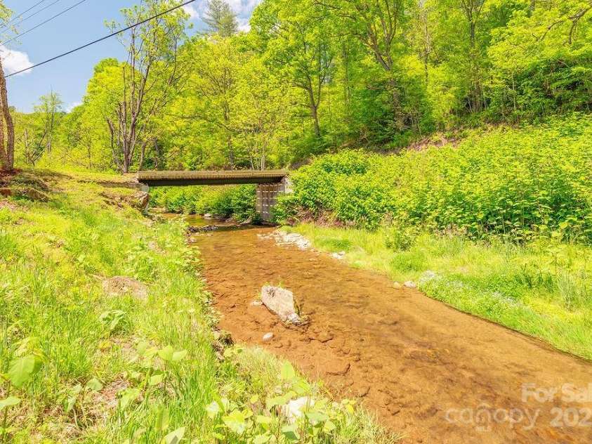 2102 Walnut CreeK Road, Marshall, NC 28753.  MLS# CAR4235544, YatesRealty ID 13420. It is Stunning