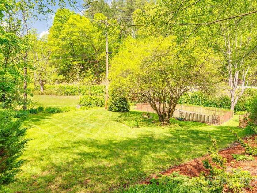 2102 Walnut CreeK Road, Marshall, NC 28753.  MLS# CAR4235544, YatesRealty ID 13420. Large Fenced Garden Space & Compost Area