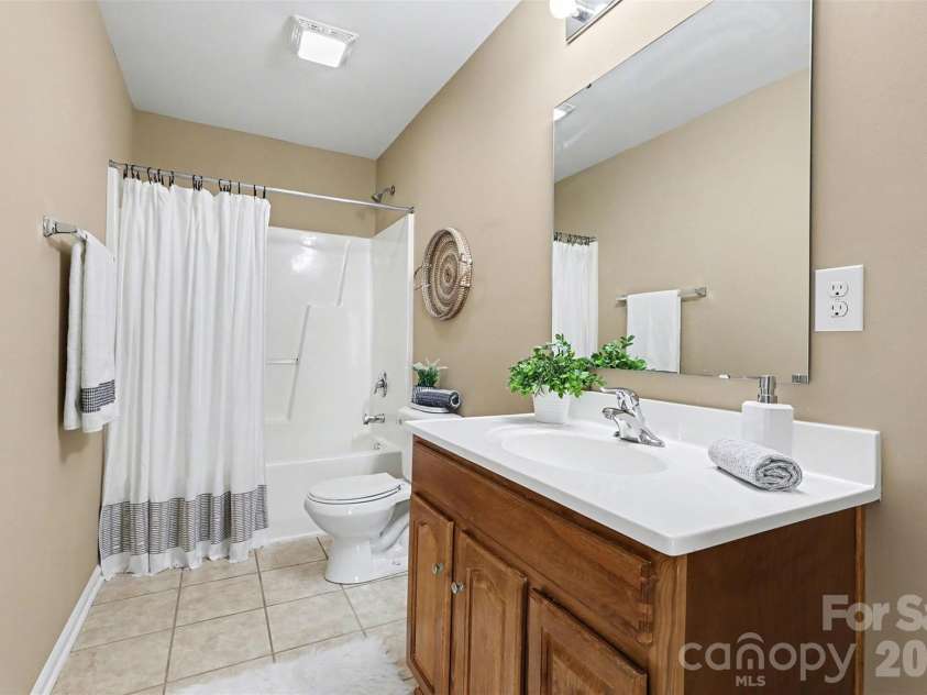 1806 Tradd Avenue, Clover, SC 29710.  MLS# CAR4362230, YatesRealty ID 13421. Secondary bathroom with tile floor