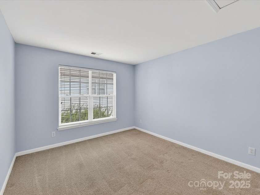 15815 Lavenham Road, Huntersville, NC 28078.  MLS# CAR4328417, YatesRealty ID 13422. Bedroom 2 on upper level features attic storage!