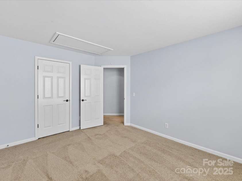 15815 Lavenham Road, Huntersville, NC 28078.  MLS# CAR4328417, YatesRealty ID 13422. Bedroom 2 on upper level features attic storage!
