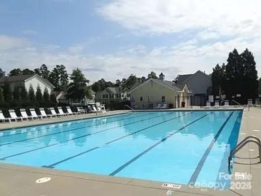 4741 Nijinsky Court, Charlotte, NC 28216.  MLS# CAR4186000, YatesRealty ID 13422. Community pool