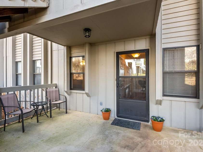 1303 Abbey Circle, Asheville, NC 28805.  MLS# CAR4238070, YatesRealty ID 13426. Front Door