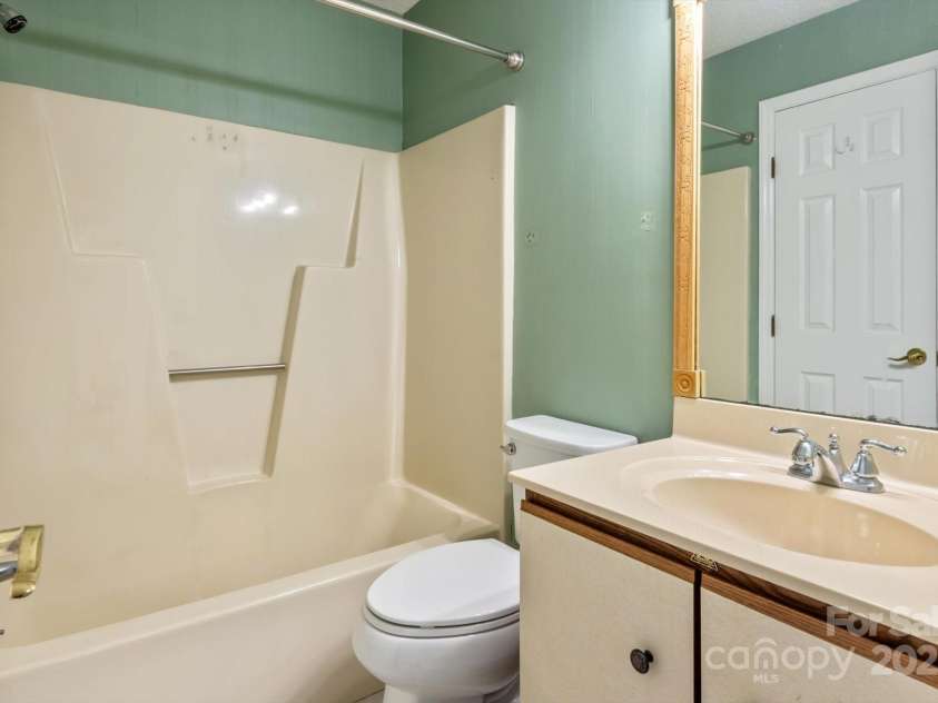 1303 Abbey Circle, Asheville, NC 28805.  MLS# CAR4238070, YatesRealty ID 13426. Hall/Second Bedroom attached bathroom