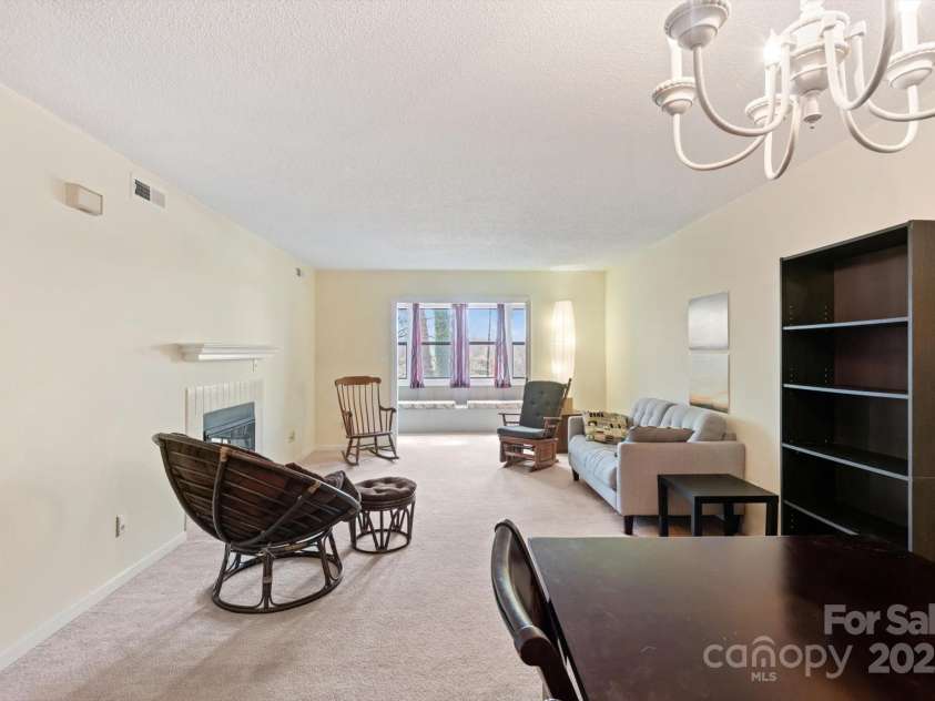 1303 Abbey Circle, Asheville, NC 28805.  MLS# CAR4238070, YatesRealty ID 13426. Living room