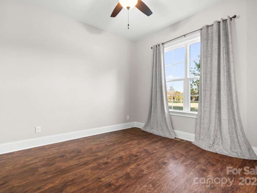 121 Dabbling Duck Circle, Mooresville, NC 28117.  MLS# CAR4232338, YatesRealty ID 13427. Bedroom #2 on main level