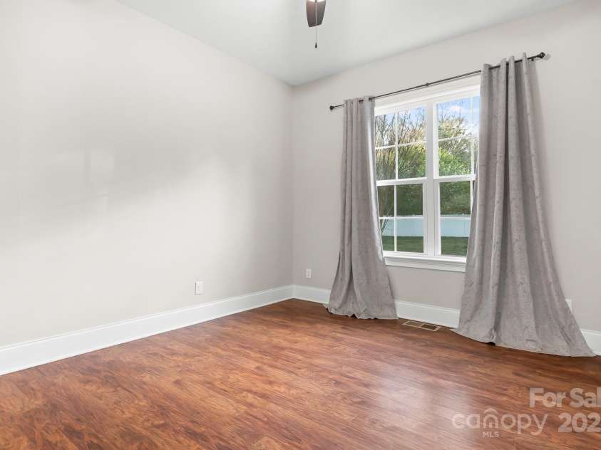 121 Dabbling Duck Circle, Mooresville, NC 28117.  MLS# CAR4232338, YatesRealty ID 13427. Bedroom #3 on main level