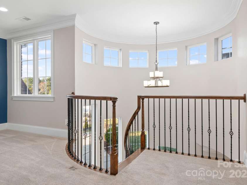 121 Dabbling Duck Circle, Mooresville, NC 28117.  MLS# CAR4232338, YatesRealty ID 13427. Landing at top of stairs