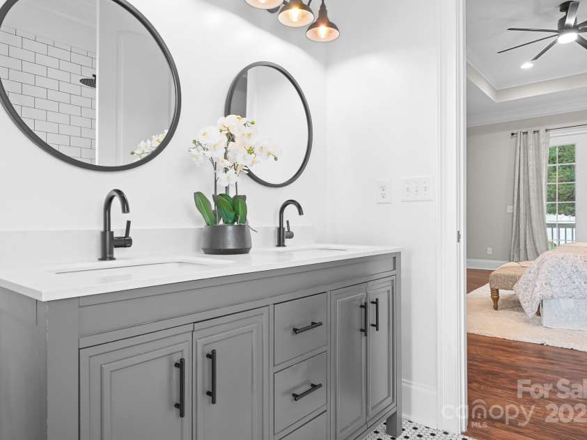 121 Dabbling Duck Circle, Mooresville, NC 28117.  MLS# CAR4232338, YatesRealty ID 13427. Primary bath vanity