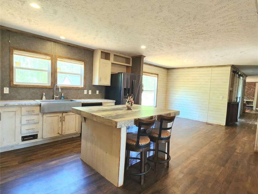 400 Mac Drive, Marion, NC 28752.  MLS# CAR4371147, YatesRealty ID 13429. Kitchen from living room
