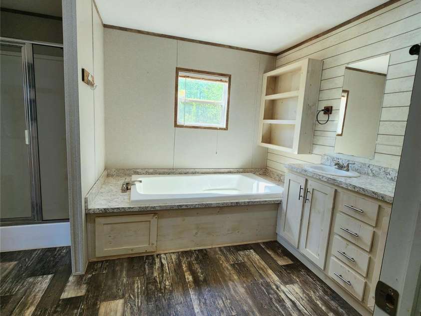 400 Mac Drive, Marion, NC 28752.  MLS# CAR4371147, YatesRealty ID 13429. Primary Bathroom