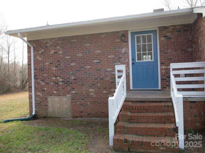 31655 Pinewood Drive, New London, NC 28127.  MLS# CAR4205536, YatesRealty ID 1343. Back Entrance