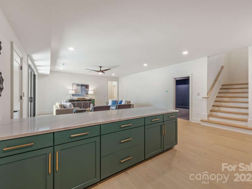 626 Concord Road, Davidson, NC 28036.  MLS# CAR4160733, YatesRealty ID 13431. Lower Level Island