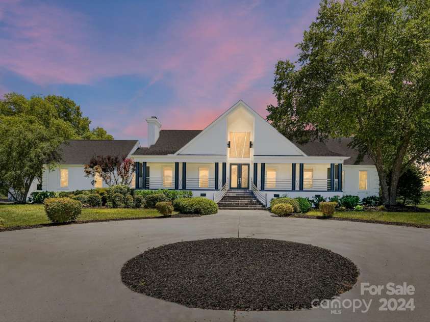 3245 Jackson Road, Mooresville, NC 28115.  MLS# CAR4161494, YatesRealty ID 13432. Exterior Front with circular driveway!
