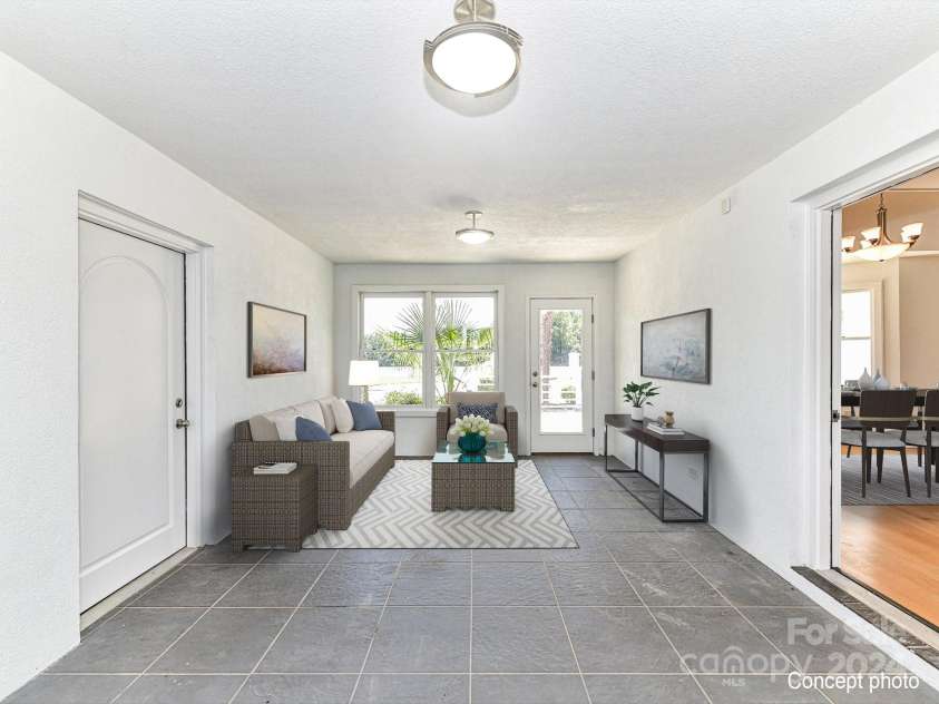 3245 Jackson Road, Mooresville, NC 28115.  MLS# CAR4161494, YatesRealty ID 13432. Flex Space/Sunroom with tile floors & patio access!