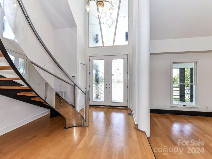 3245 Jackson Road, Mooresville, NC 28115.  MLS# CAR4161494, YatesRealty ID 13432. Grand Foyer Entry with custom leaded glass double doors & window!