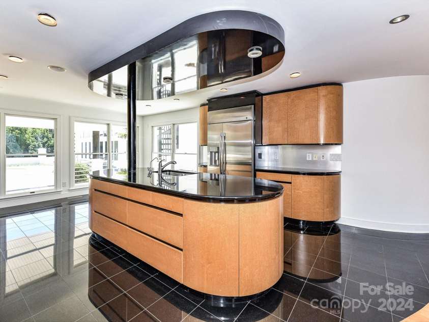 3245 Jackson Road, Mooresville, NC 28115.  MLS# CAR4161494, YatesRealty ID 13432. Large Kitchen offers stainless steel appliances including double oven, hood systen, center island, & plenty of modern cabinetry for storage!