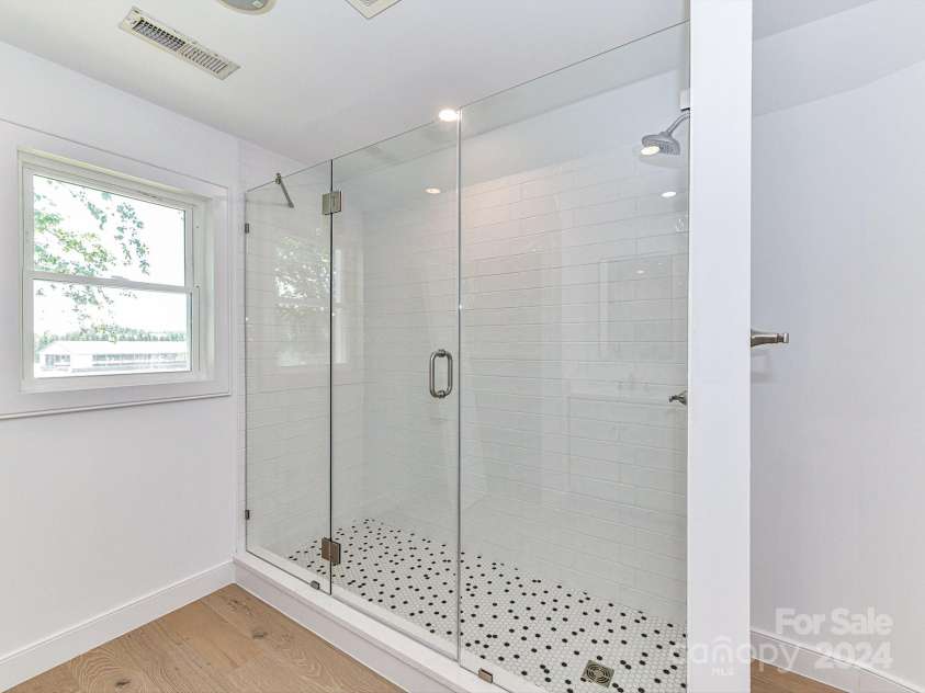 3245 Jackson Road, Mooresville, NC 28115.  MLS# CAR4161494, YatesRealty ID 13432. Walk In Tiled shower in Primary Bath!