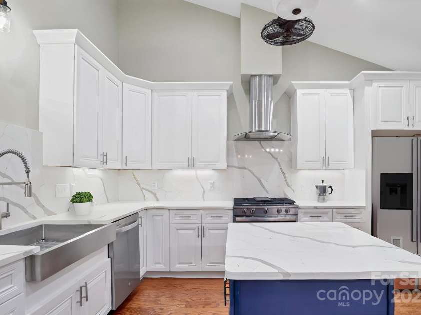 20 Brookstone Place, Candler, NC 28715.  MLS# CAR4248031, YatesRealty ID 13436. Kitchen w/Island & Quartz Countertops