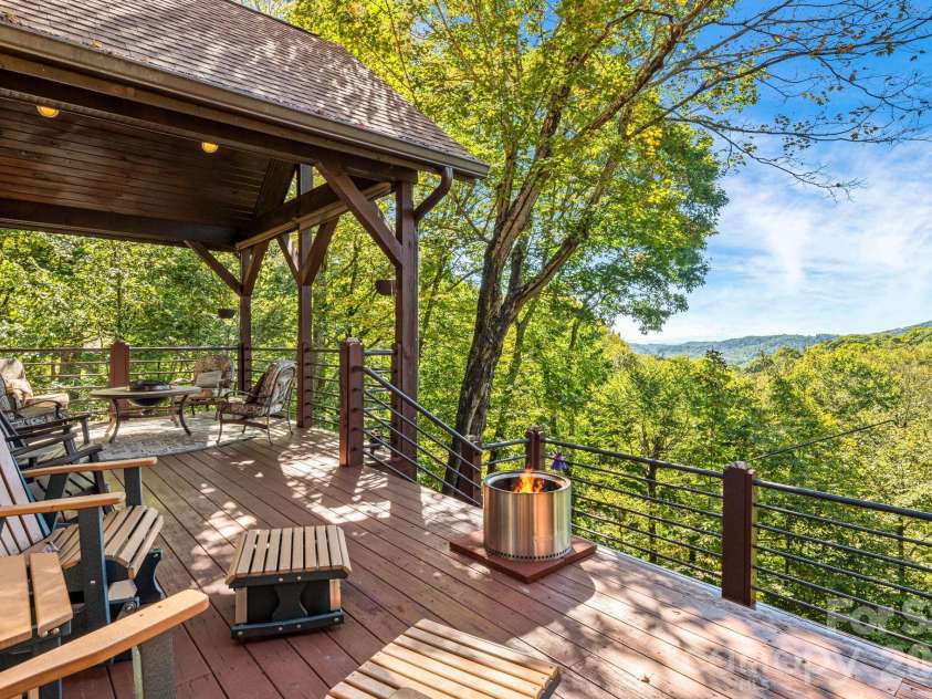 191 Ivy Way, Mars Hill, NC 28754.  MLS# CAR4308782, YatesRealty ID 1344. 4,000 ft in elevation mountain home w/ year rounds views and a creek. 