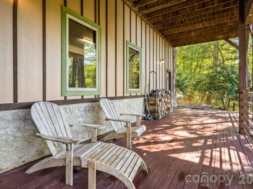 191 Ivy Way, Mars Hill, NC 28754.  MLS# CAR4308782, YatesRealty ID 1344. Covered deck off off the lower level bedroom and garage.