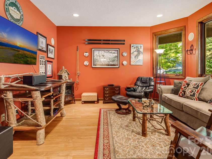 191 Ivy Way, Mars Hill, NC 28754.  MLS# CAR4308782, YatesRealty ID 1344. Main level media room