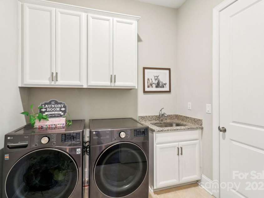 1004 Princesa Drive, Matthews, NC 28104.  MLS# CAR4251580, YatesRealty ID 13440. Laundry Room