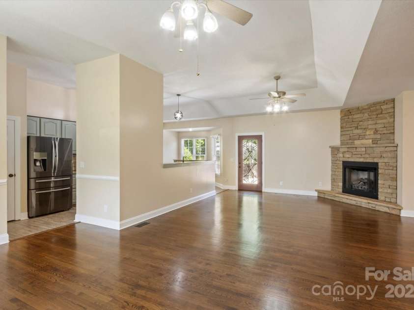 2409 Golf Course Road, Columbus, NC 28722.  MLS# CAR4318941, YatesRealty ID 13442. Wood floors in living room.