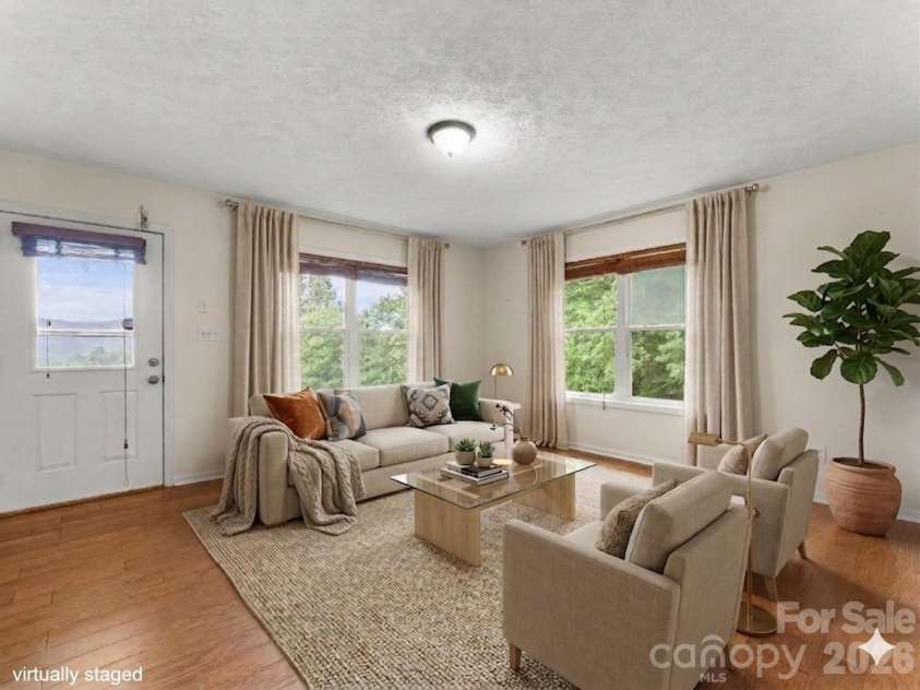 96 Habitat Way, Brevard, NC 28712.  MLS# CAR4342225, YatesRealty ID 13444. Virtually Staged Living Room