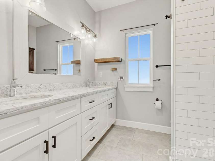 180 Moody Avenue, Candler, NC 28715.  MLS# CAR4366838, YatesRealty ID 13449. 