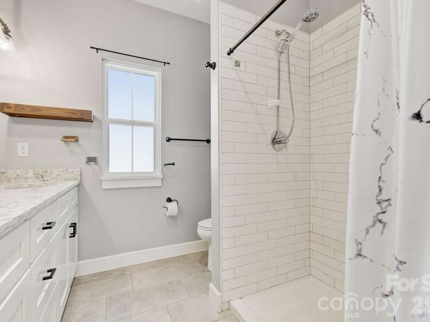 180 Moody Avenue, Candler, NC 28715.  MLS# CAR4366838, YatesRealty ID 13449. 