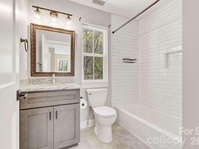 180 Moody Avenue, Candler, NC 28715.  MLS# CAR4366838, YatesRealty ID 13449. 