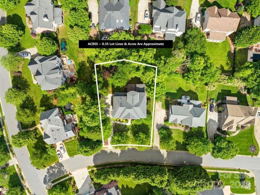 9311 St Barts Lane, Huntersville, NC 28078.  MLS# CAR4255582, YatesRealty ID 13449. Aerial view of home shows you the wooded yard that offers wonderful privacy!