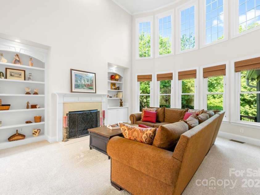 9311 St Barts Lane, Huntersville, NC 28078.  MLS# CAR4255582, YatesRealty ID 13449. Great room with built-in cabinets and shelving