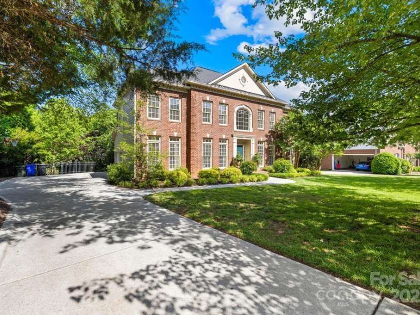 9311 St Barts Lane, Huntersville, NC 28078.  MLS# CAR4255582, YatesRealty ID 13449. Large driveway with 3-car garage